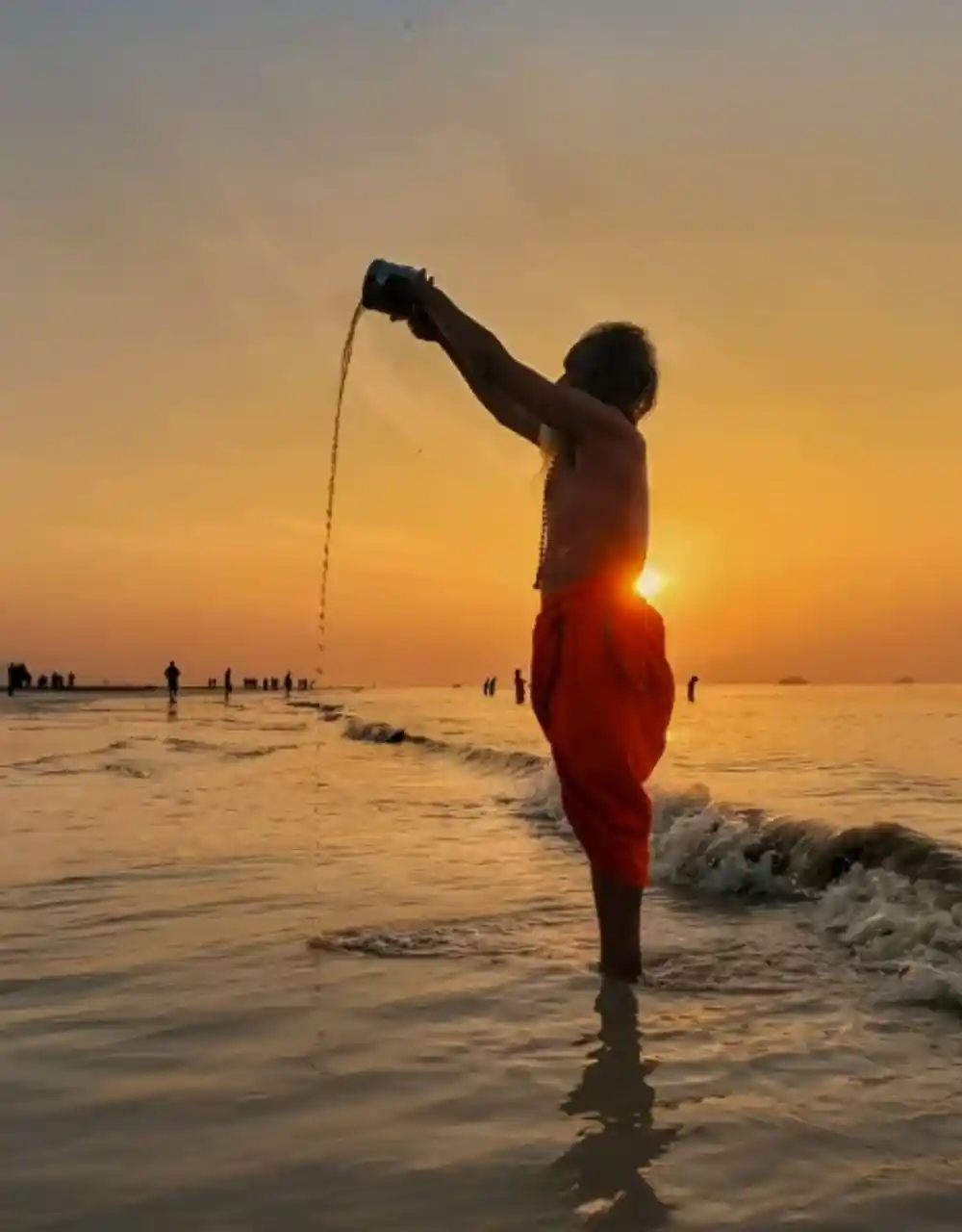 Baba having holy dip in Gangasagar